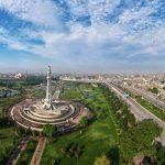 Aerial view of Lahore city with Minar-e-Pakistan highlighting DHA Lahore real estate investment opportunities in 2025